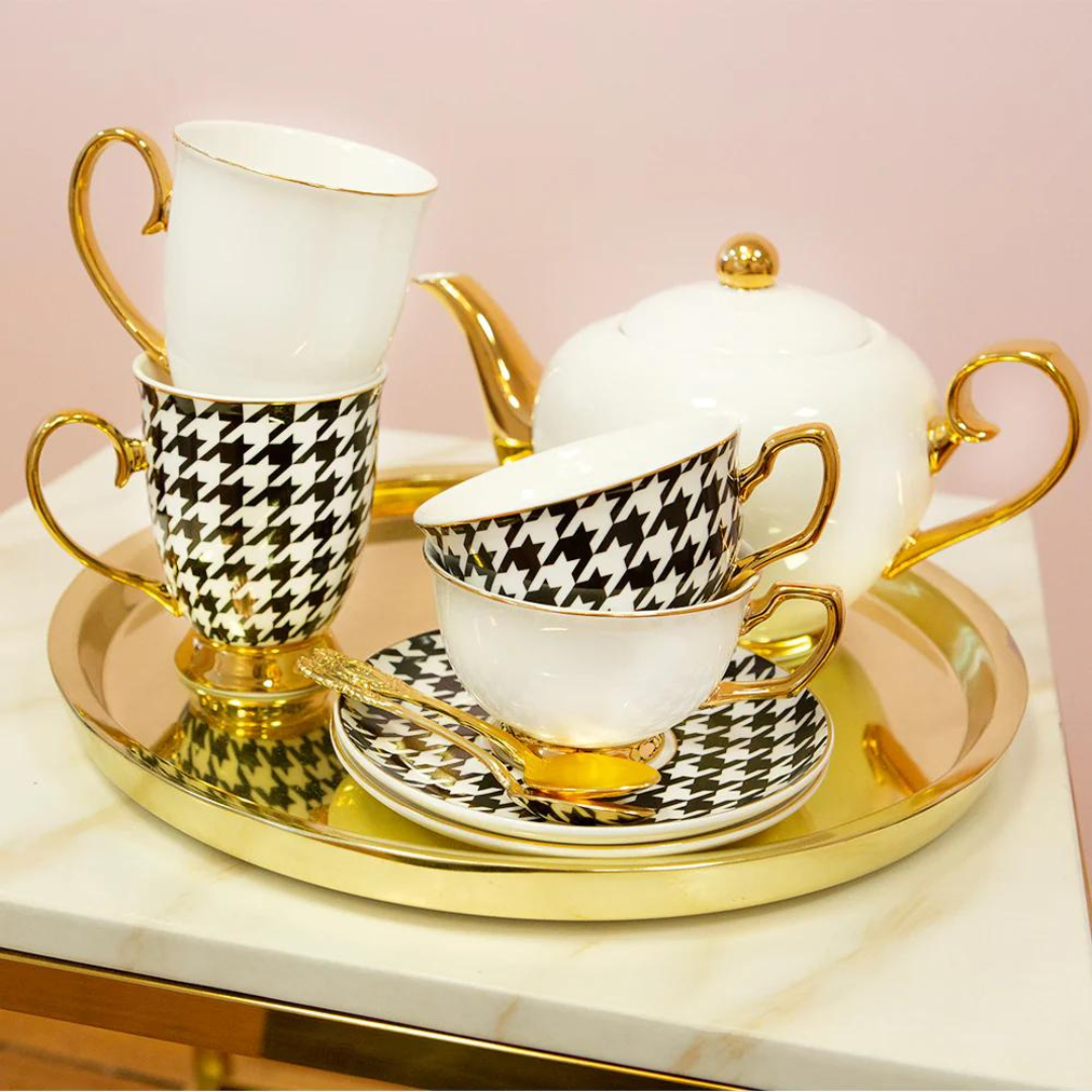 Stylish Houndstooth Mug with Signature Gift Box - Vegan-friendly New Bone China mug with 24ct gold trimmings. Ideal for High Tea and designed to be a timeless collectible. Size: 300mL. Hand-washing recommended. Not microwave safe.